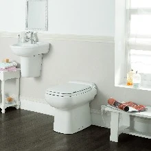 SFA Sanicompact Luxe staand toilet met ingebouwde vergruizer - met zitting - wit C3SENL